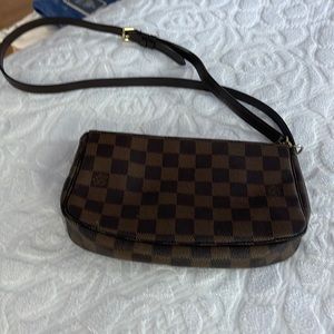 Small Louis Vuitton crossbody. Fits phone and much more!